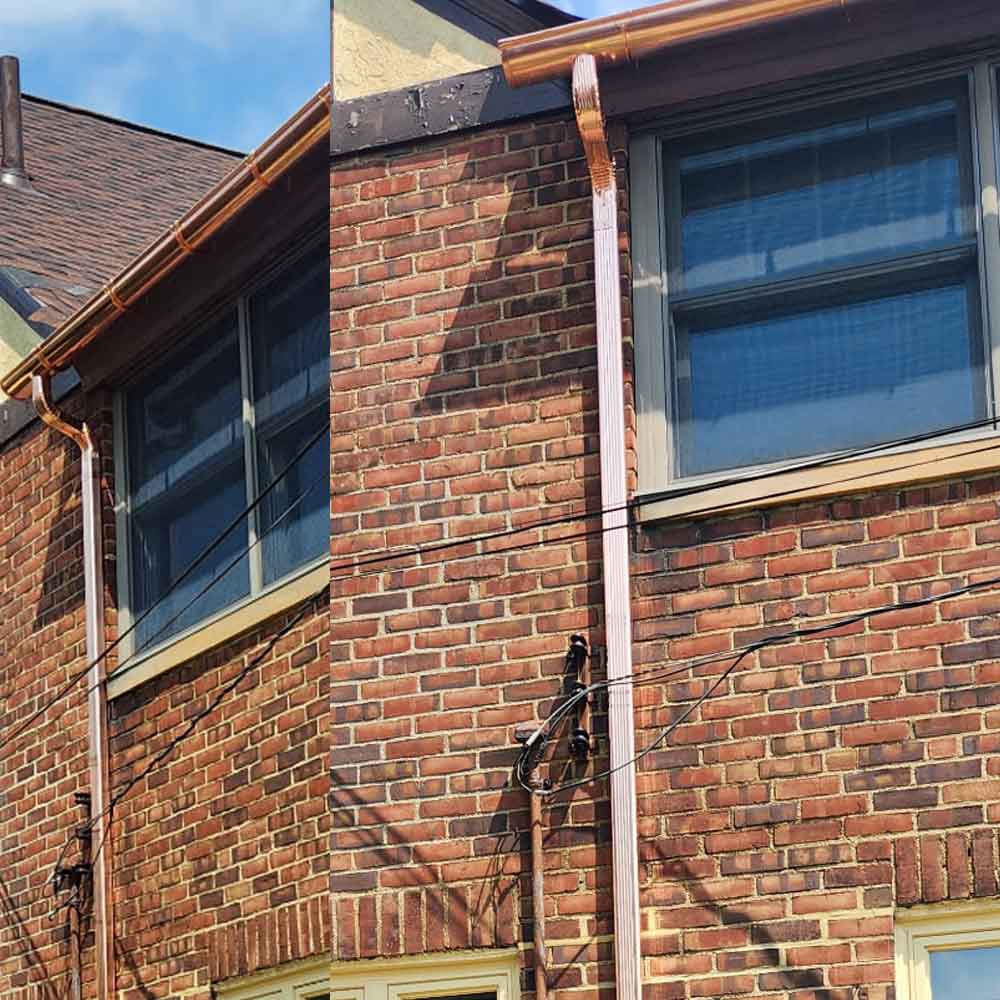 Half round gutters on a building installed by Monde Gutters and Home Improvement